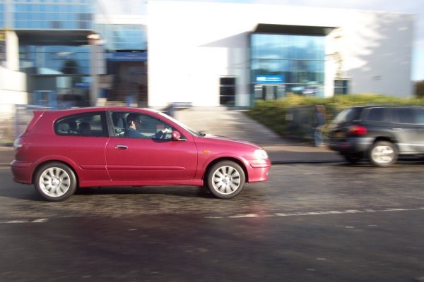 A car caught at speed by panning