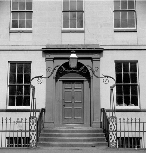 Black and white photograph of town house in Dumfries.