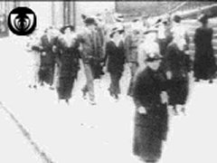 Sunday church-goers promenade along Great Western Road, Glasgow.