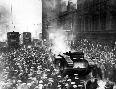 Strikers watching as soldiers and tanks roll along the Trongate, brought in to quell the rising insurrection, 1919