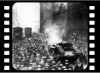 Strikers watching as soldiers and tanks roll along the Trongate, brought in to quell the rising insurrection, 1919