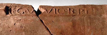 Photograph of a stamped tile from Carpow.