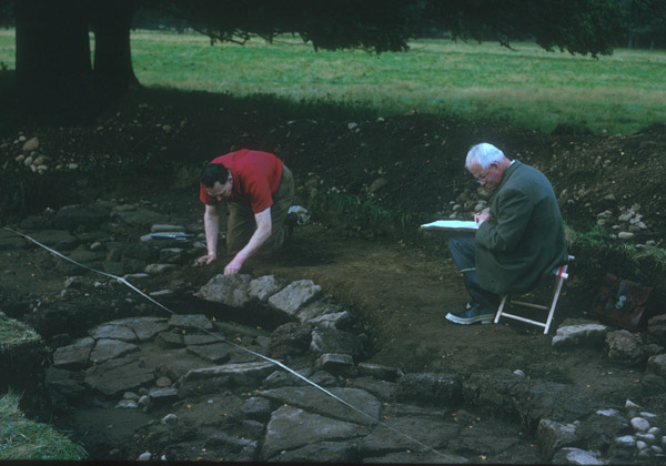 Photograph of Sir Ian Richmond excavating at Inchtuthil.