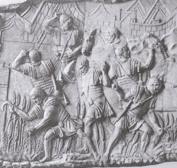 B/w photograph of legionaries harvesting grain. from Trajan's Column.