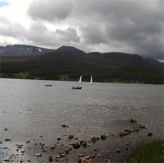 Loch Morlich with the Cairngorm Mountains in the background